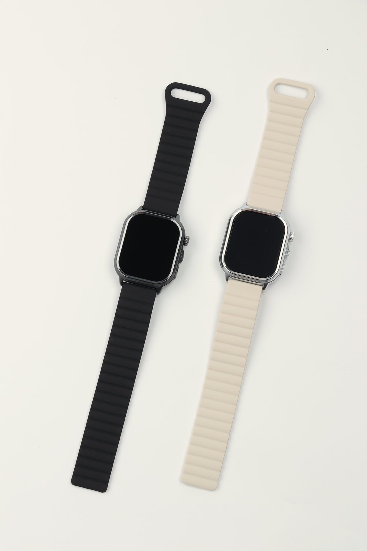 The magnetic silicone straps, black and off-white